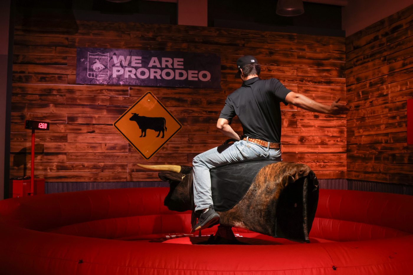 The mechanical bull set up at a corporate event