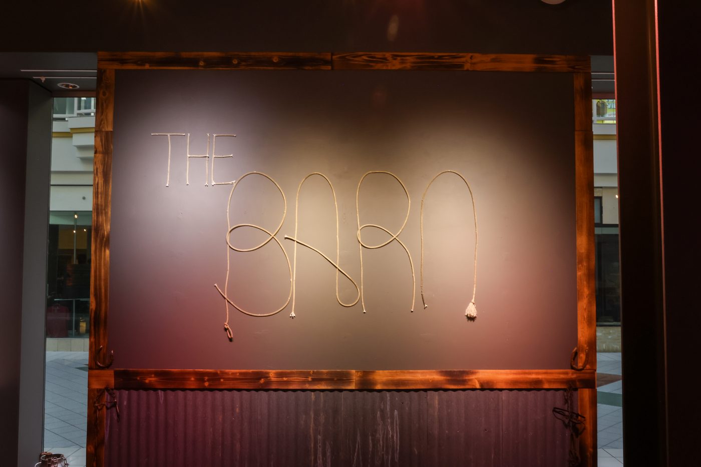 The Barn sign at the Swingin Dance Co venue entrance
