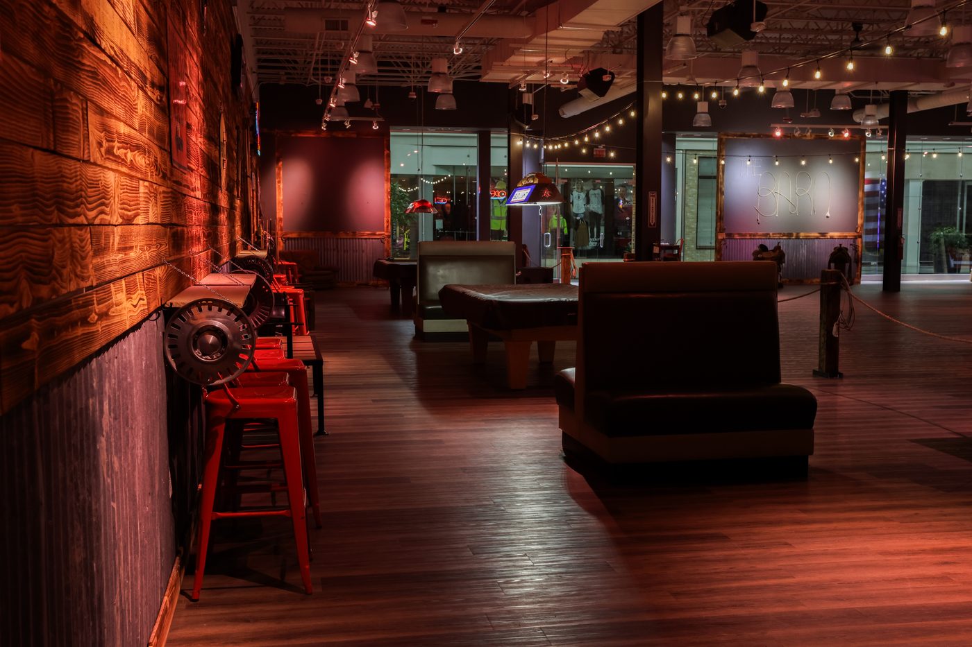 Interior view of the Swingin Dance Co venue with pool tables and seating